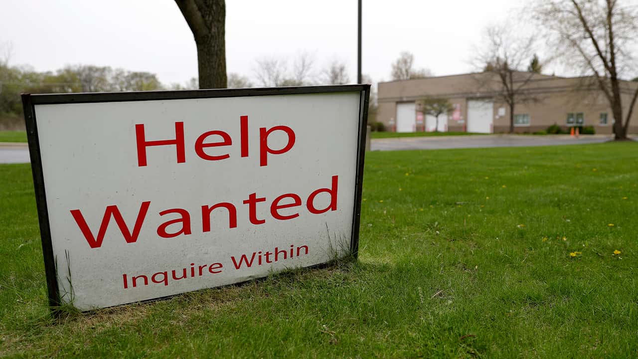 Photo of a help wanted sign