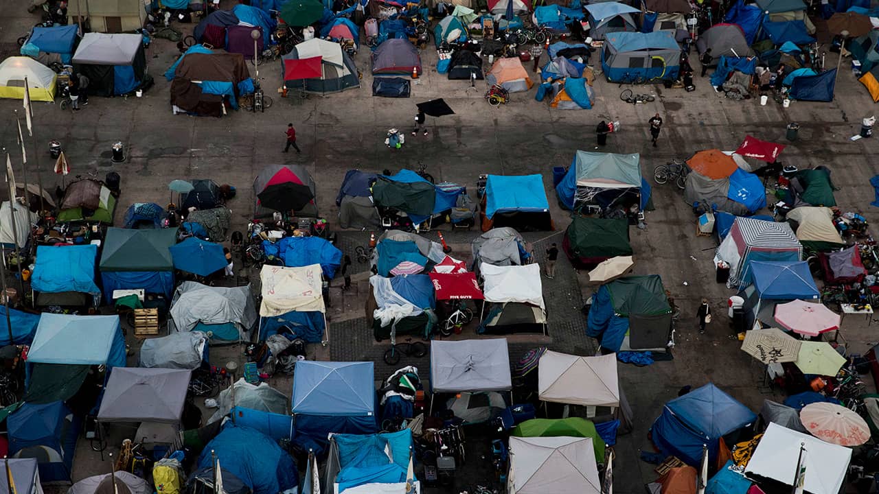 Photo of a large homeless encampment at the Santa Ana Civic Center