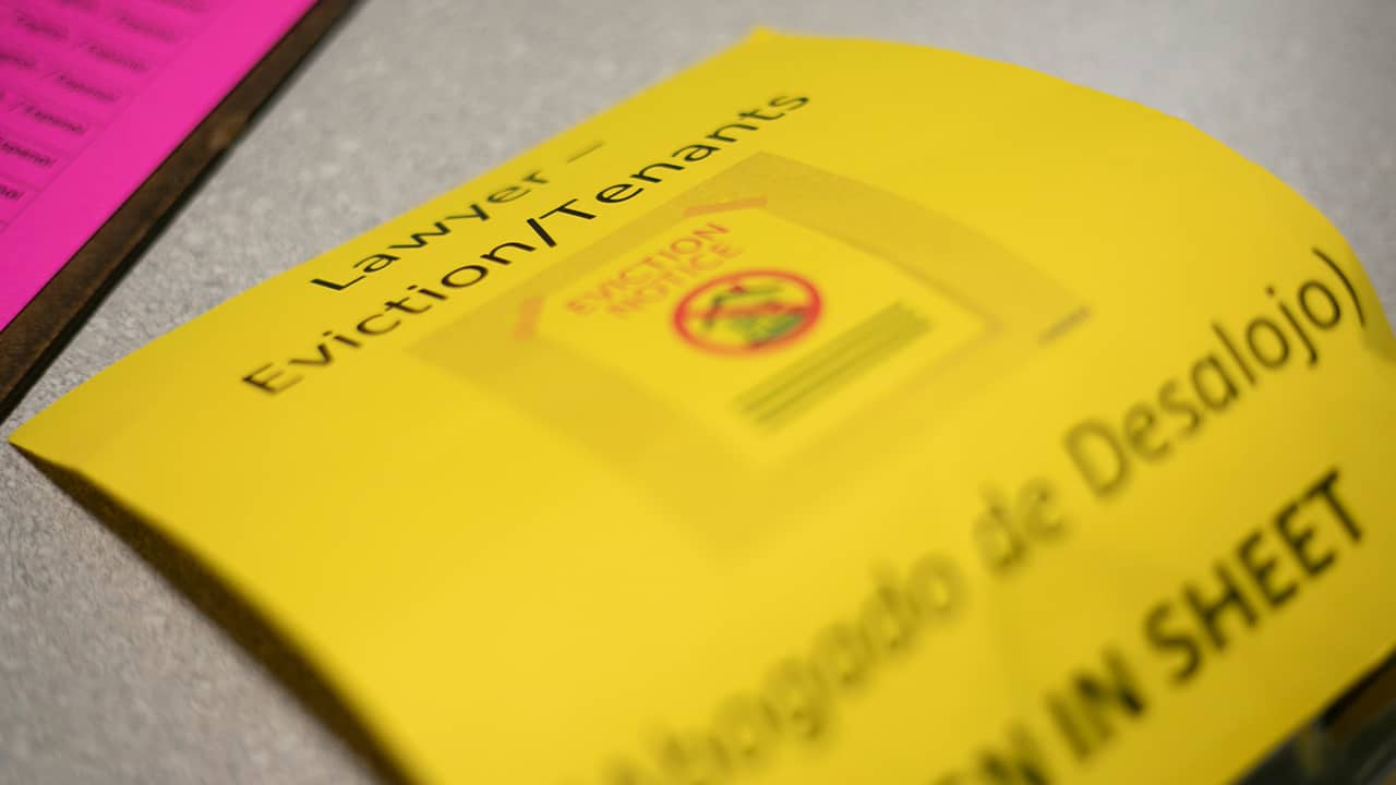 Photo of a yellow sign-in sheet 