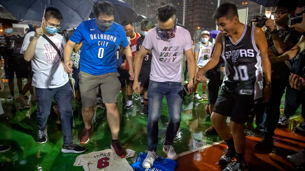 Photo of Hong Kong protestors stomping on LeBron James jerseys