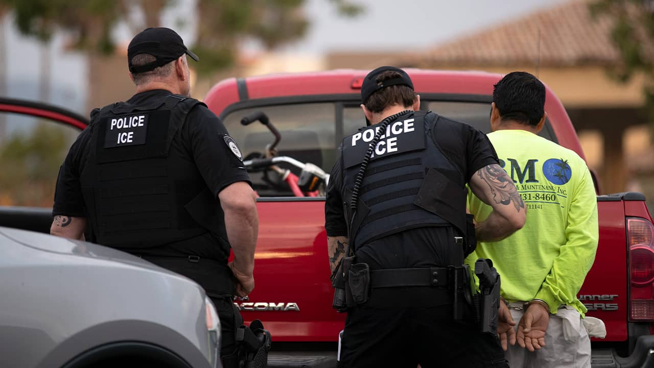 Photo of ICE arresting a man