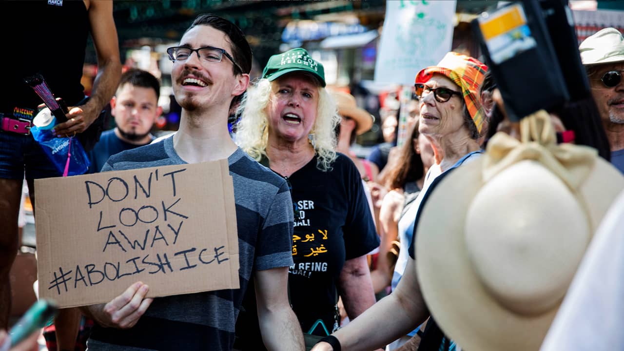 Photo of people at a rally against ICE