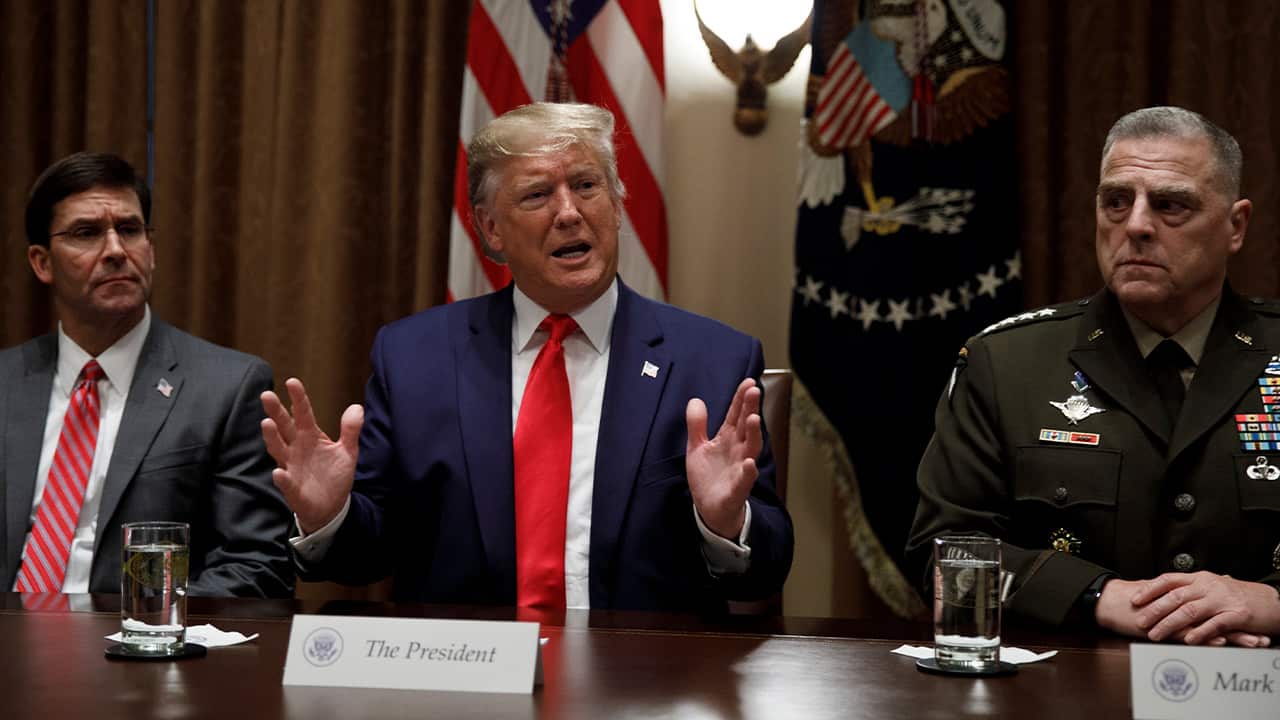 Photo of President Donald Trump, Defense Secretary Mark Esper, and Charimen of the Joint Chiefs of Staff Gen. Mark Milley