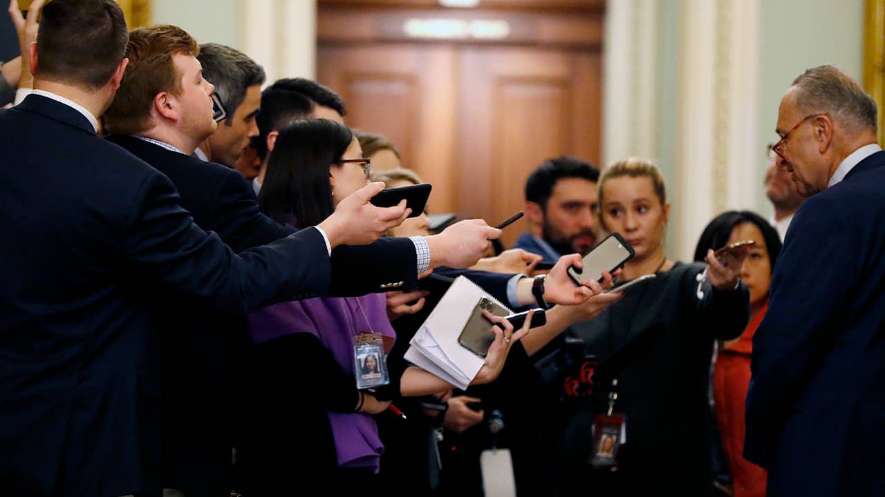 Photo of reporters at the Trump impeachment trial 