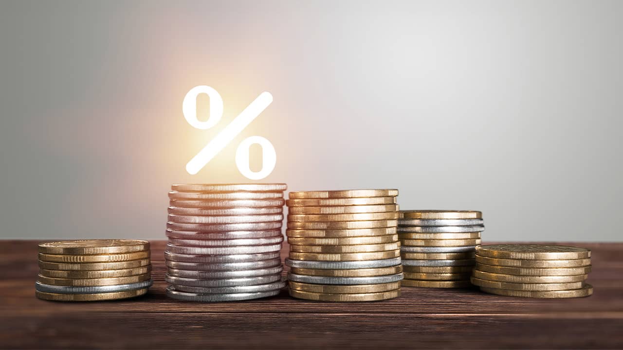 Photo of coins and % sign