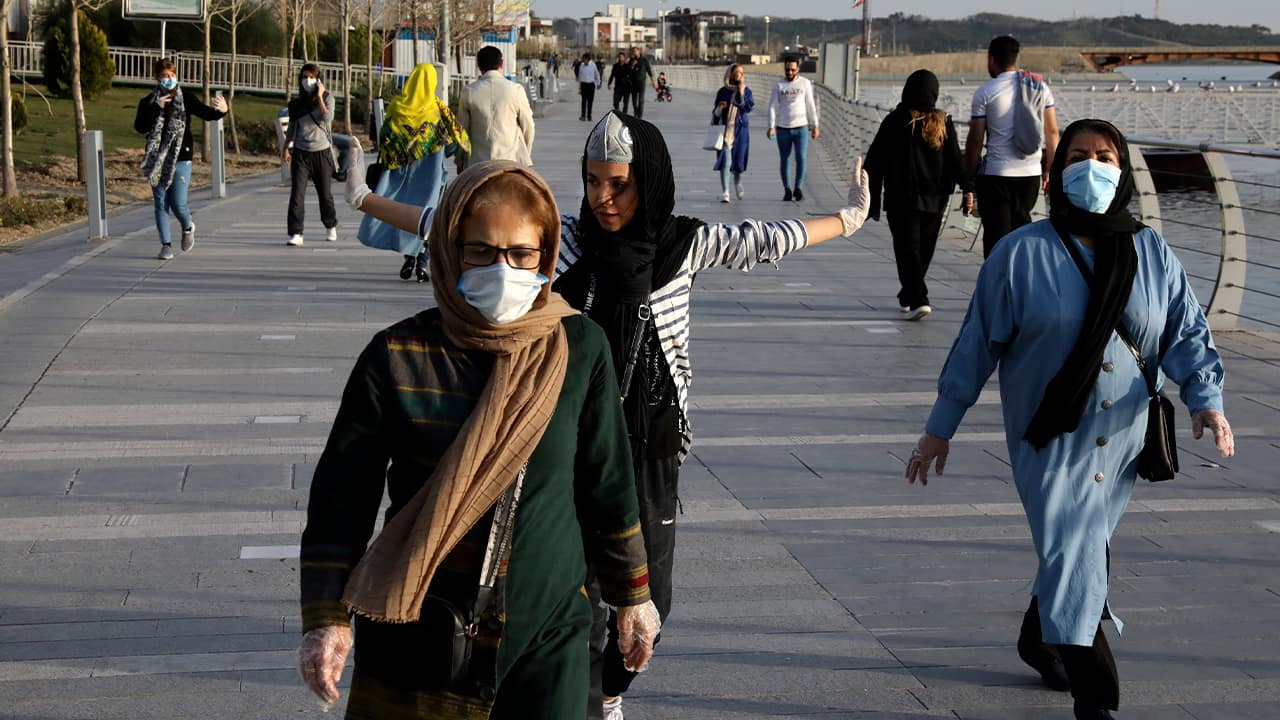 Photo of people wearing face masks in Iran