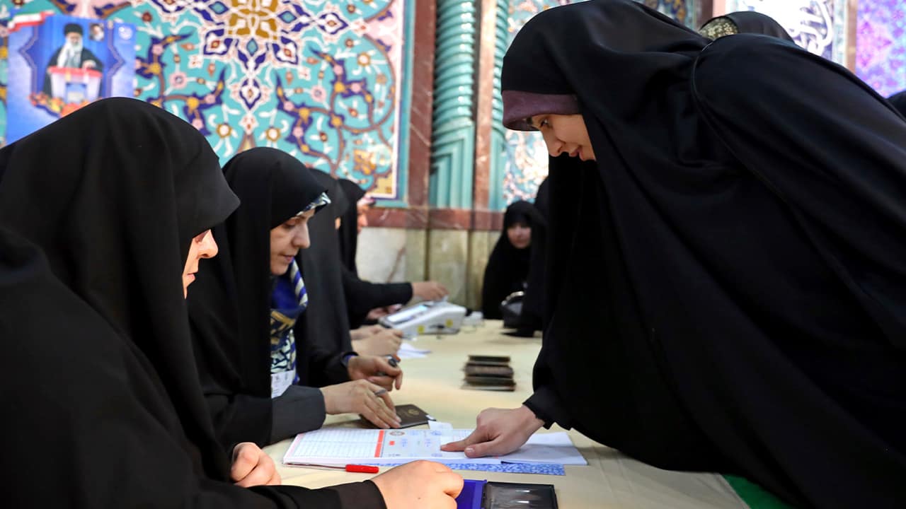 Photo of Iranian women registering to cast their votes 