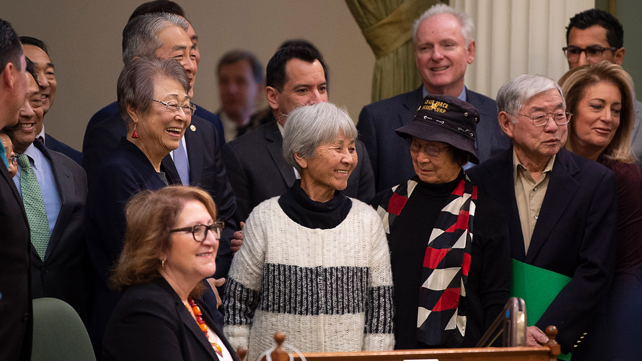 Photo of Japanese Americans who were incarcerated during World War II after the California Assembly passed House Resolution 77