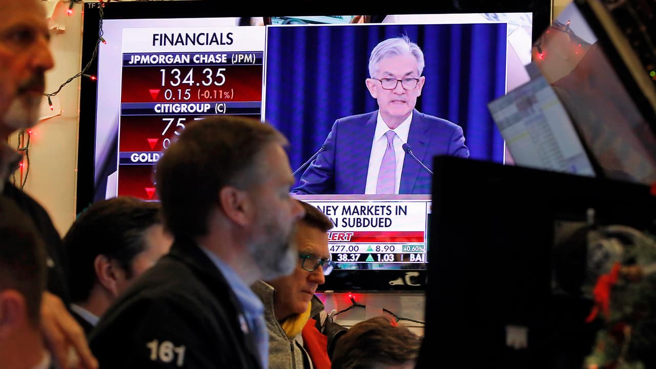 Photo of Jerome Powell on a television at the New York Stock Exchange