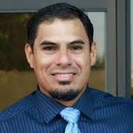 portrait of the late Justin Garza, who coached football at Central High in Fresno, California