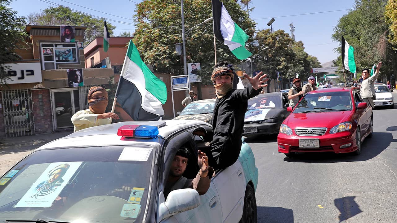 Photo of Afghans traveling in convoy in Kabul