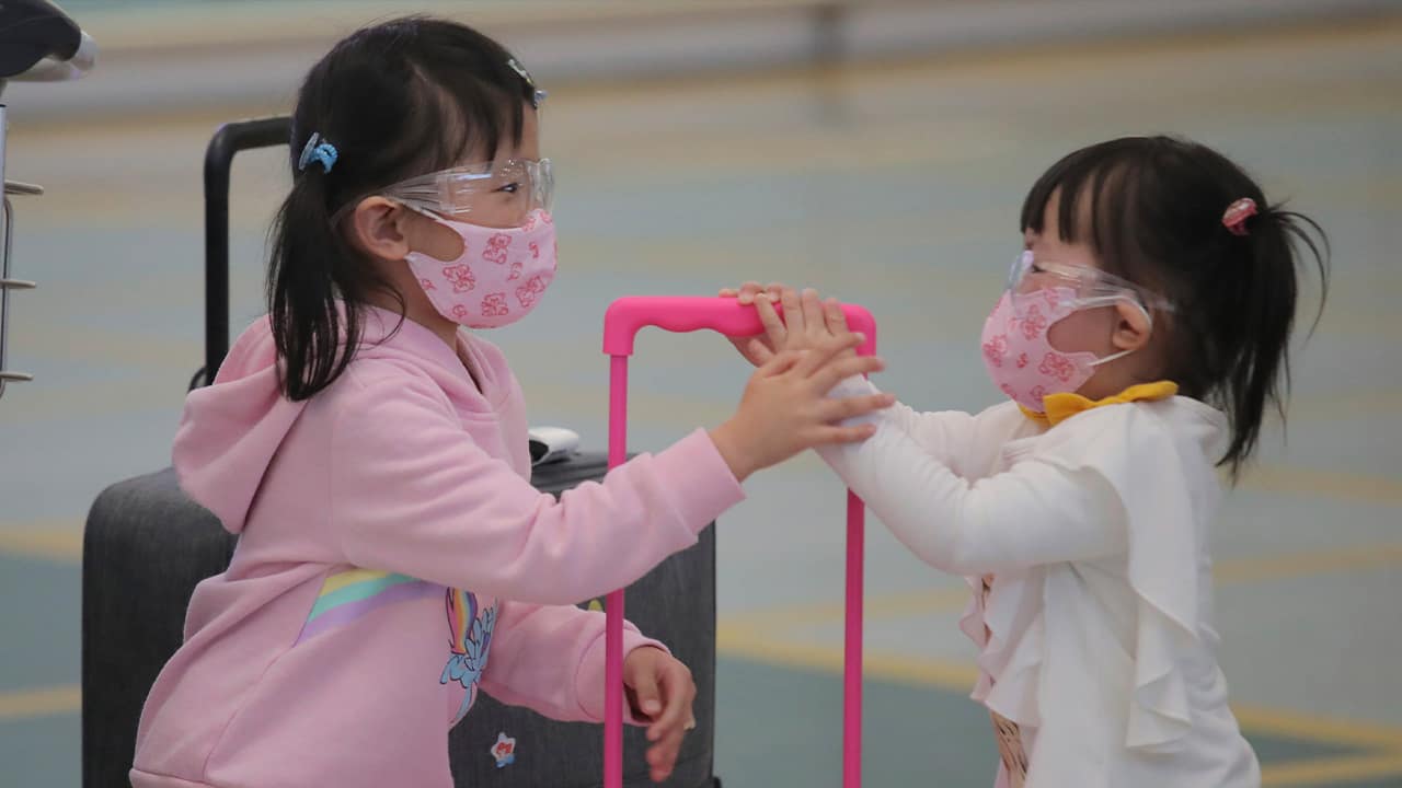 Photo of kids at the Hong Kong airport 