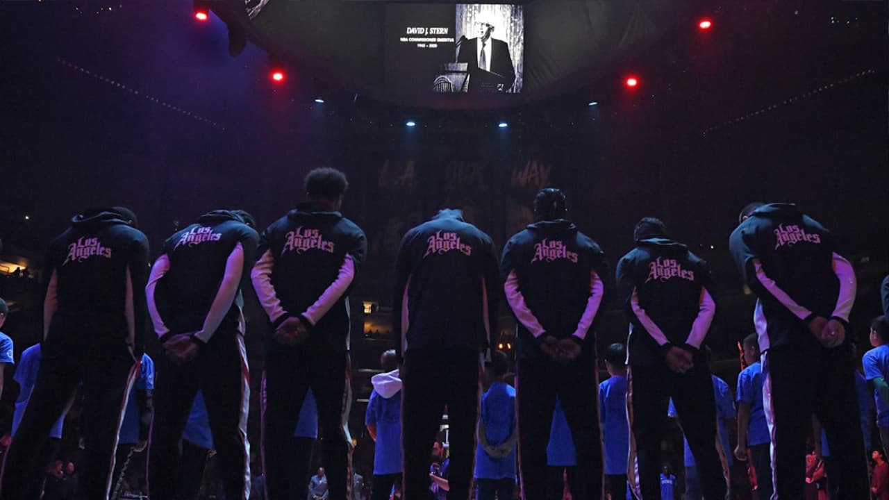 Photo of the Los Angeles Clippers during a a moment of silence Thursday, Jan. 2, 2020, in Los Angeles, prior to a basketball game against the Detroit Pistons, for former NBA Commissioner David Stern