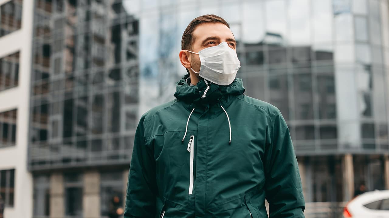 Photo of a man wearing a face mask