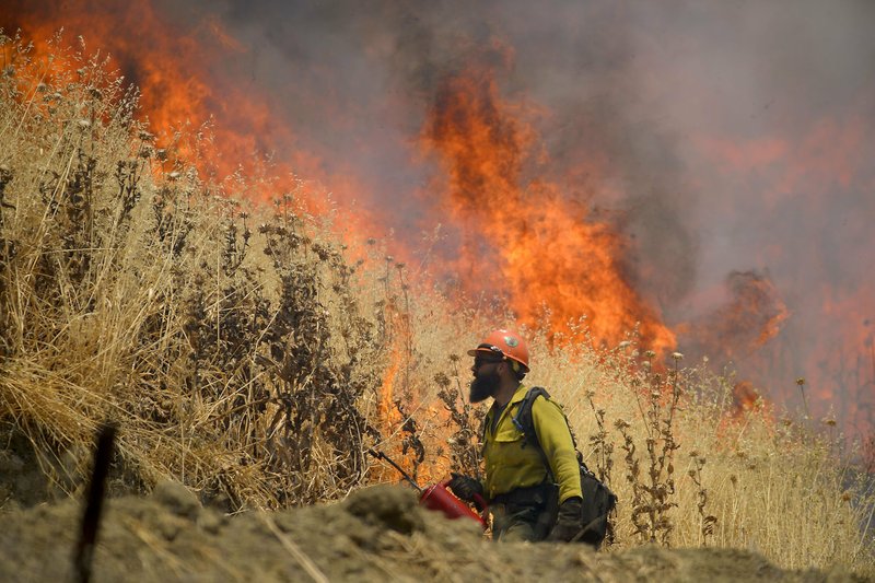 Photo of crews fighting fire in Yolo County.