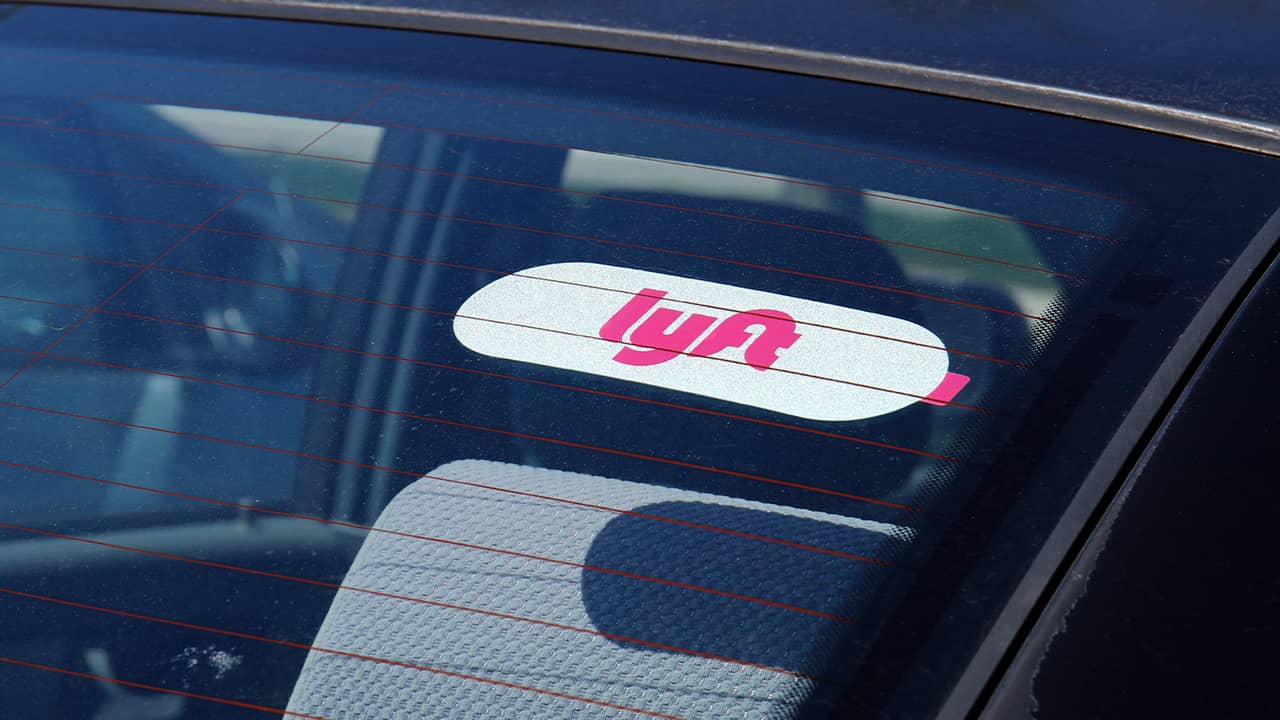 Photo of a Lyft sticker on a car window