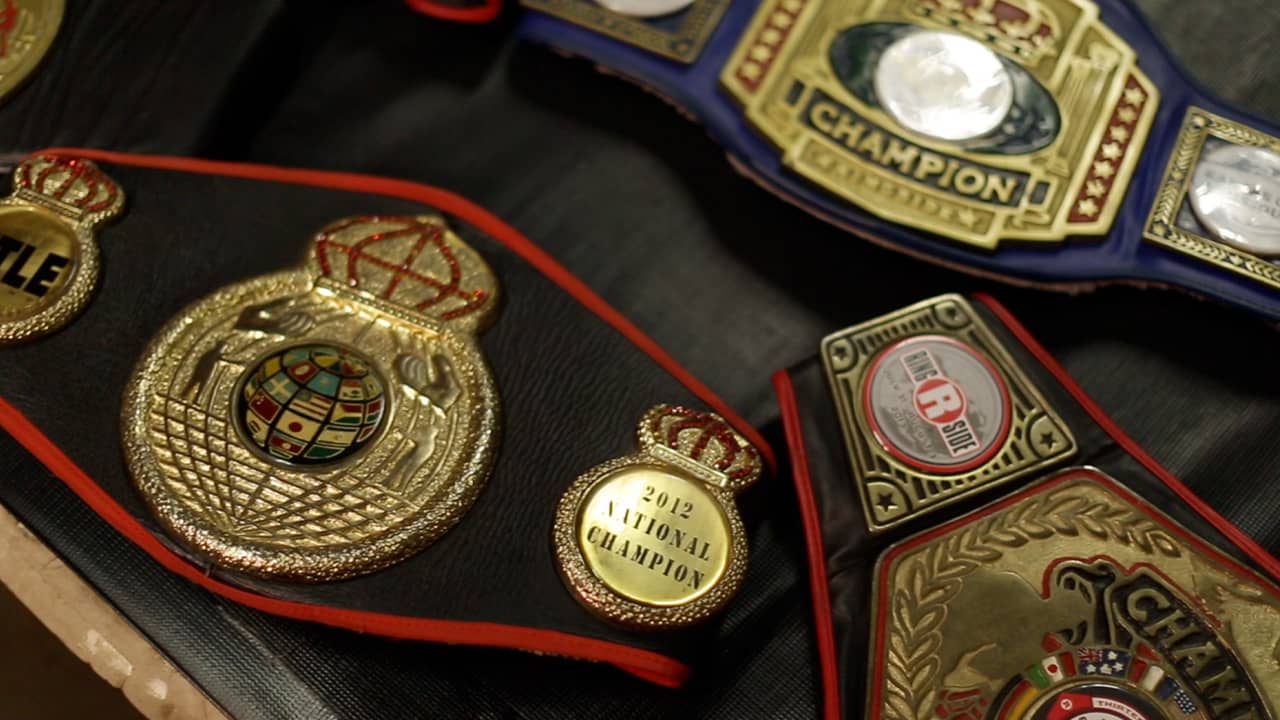 Photo of Marc Castro's championship boxing belts.