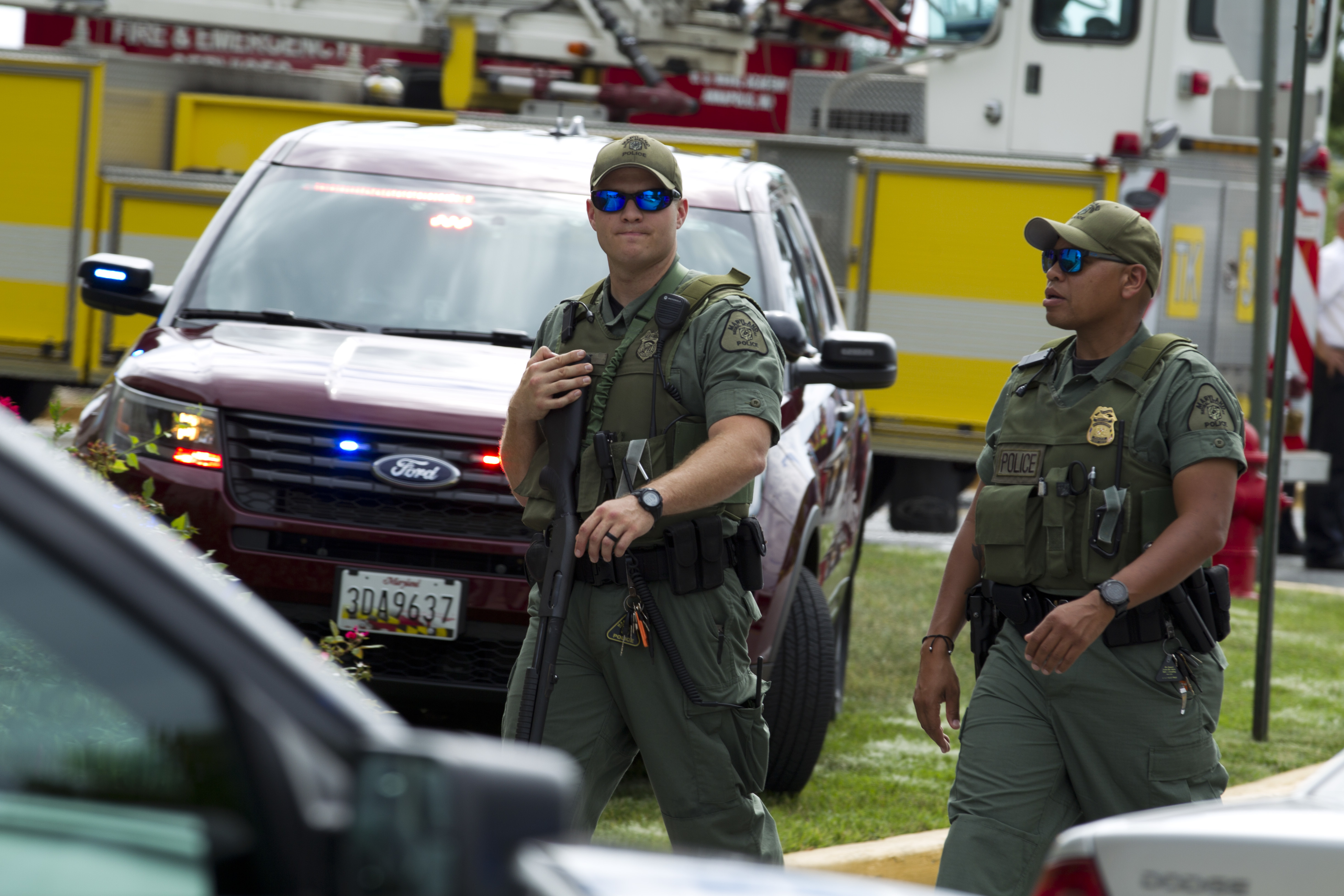 AP photo of police officers after shooting at newspaper