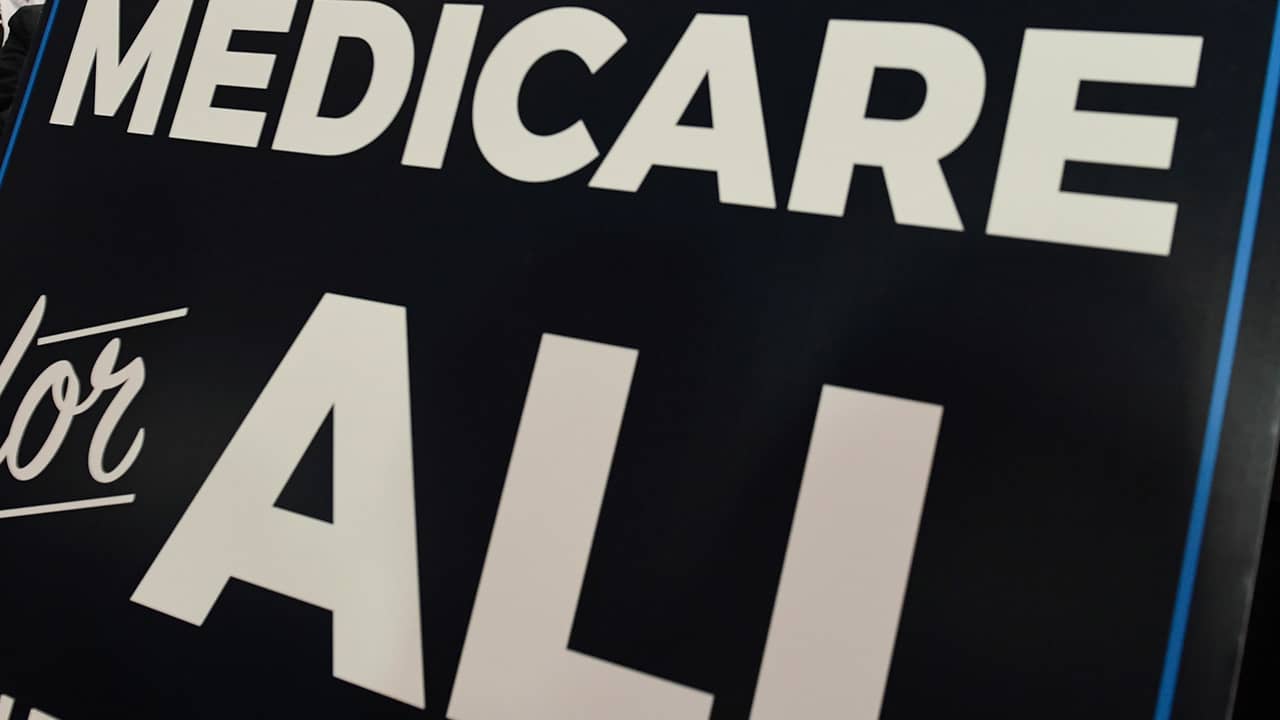 Photo of a sign stating "Medicare for All"