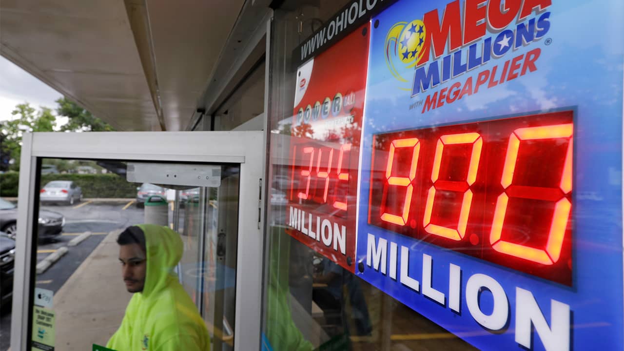 Photo of Mega Millions jackpot sign outside of a store