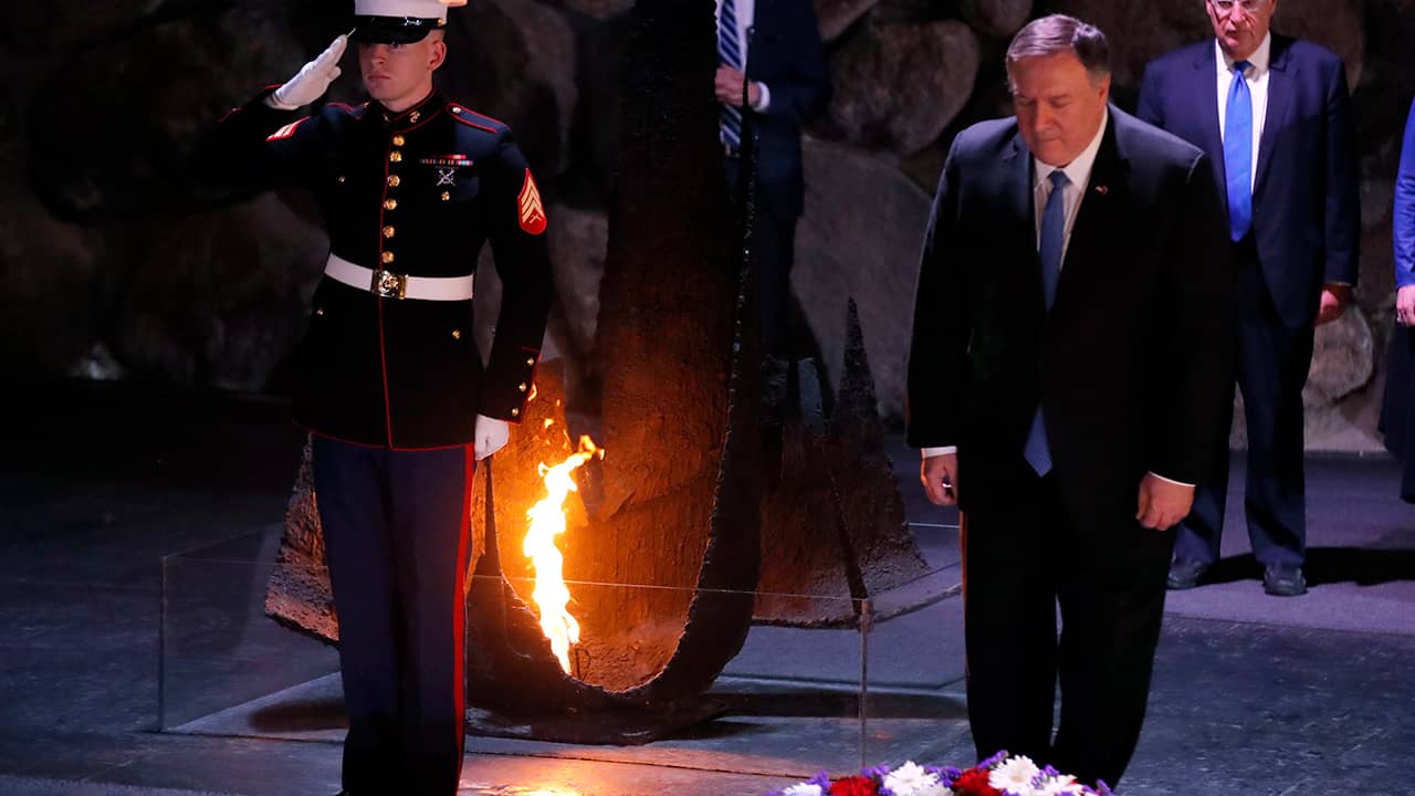 Photo of Mike Pompeo taking part in a wreath laying ceremony