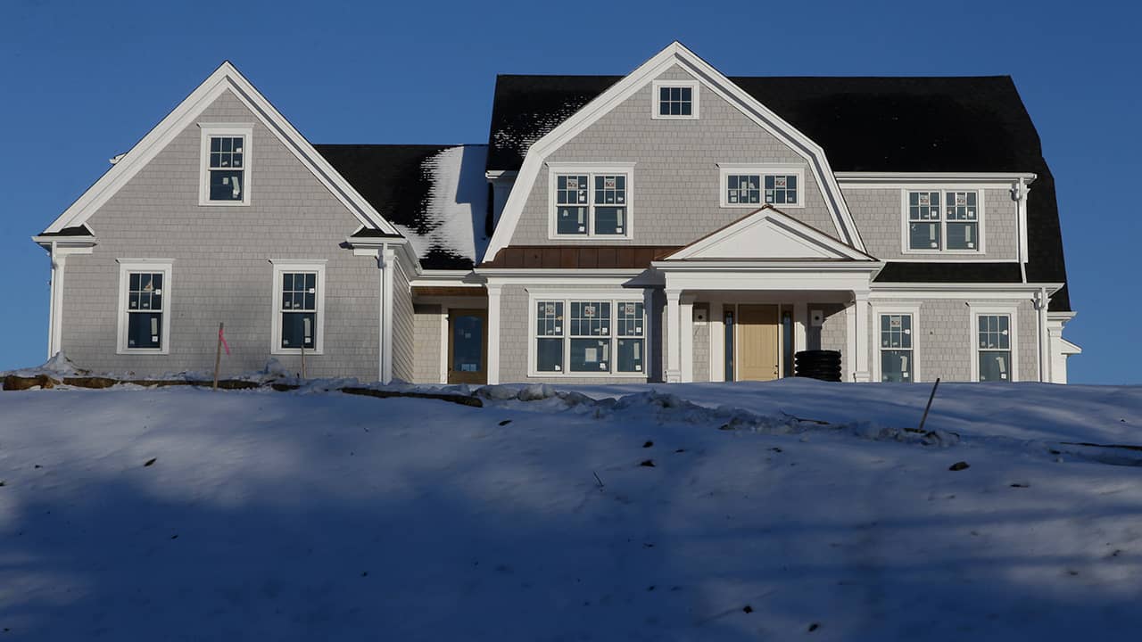 Photo of a home surrounded by snow in Natick, Mass.