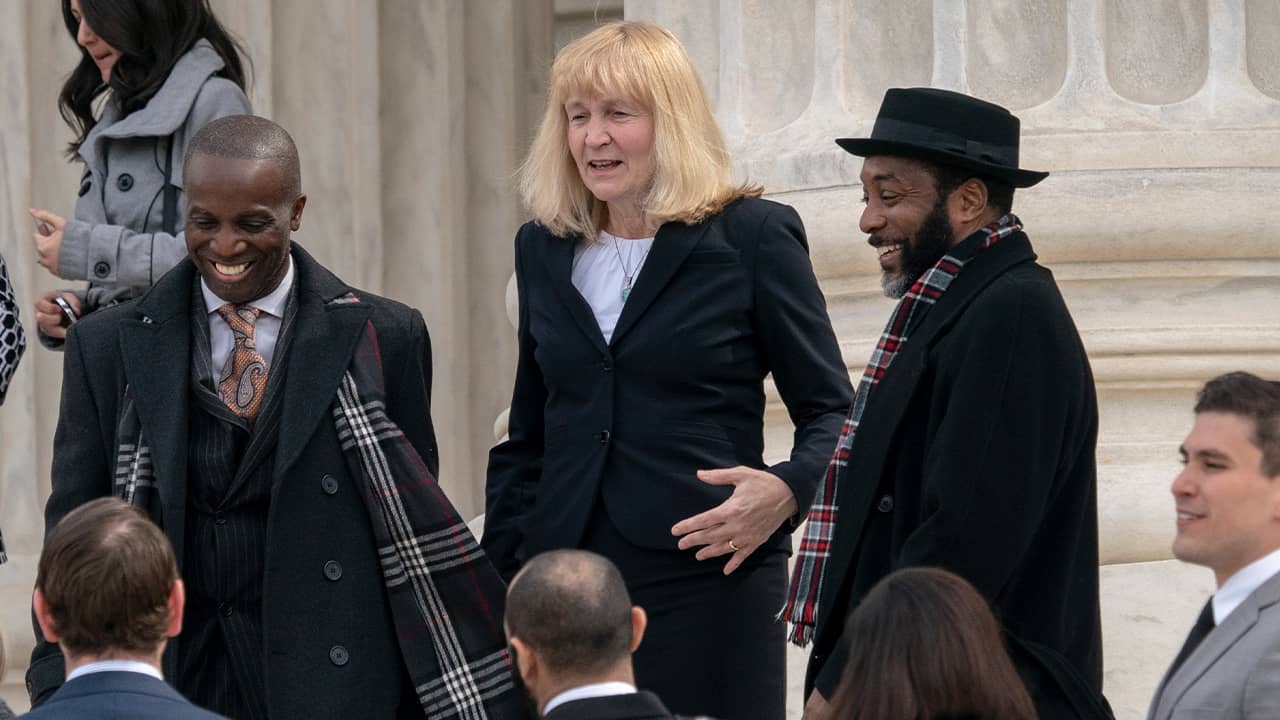Photo of Attorney Sheri Johnson leaving Supreme Court