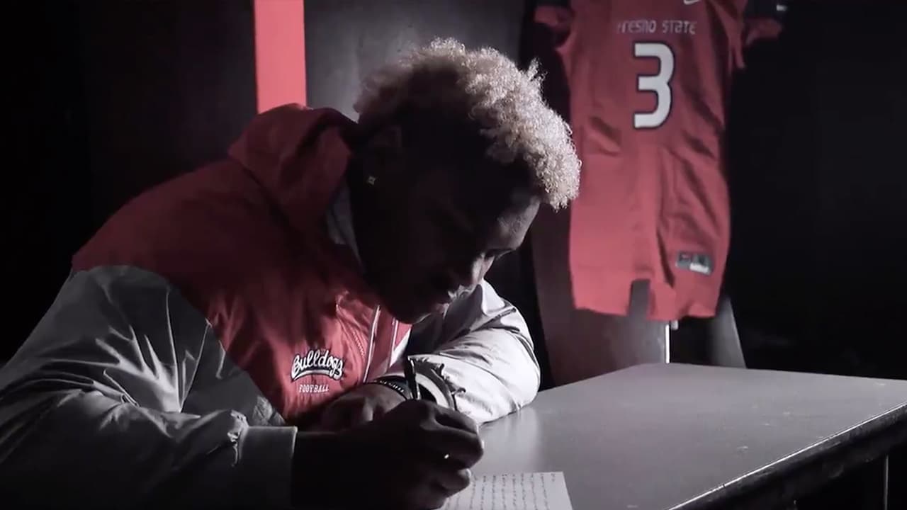 Image from video of Mykal Walker writing a letter to his late father, Michael James Walker