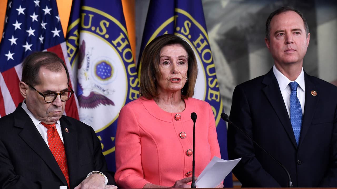 Photo of House Speaker Nancy Pelosi of Calif., center, flanked by House Judiciary Committee Chairman Rep. Jerrold Nadler, D-N.Y., left, and House Intelligence Committee Chairman Rep. Adam Schiff