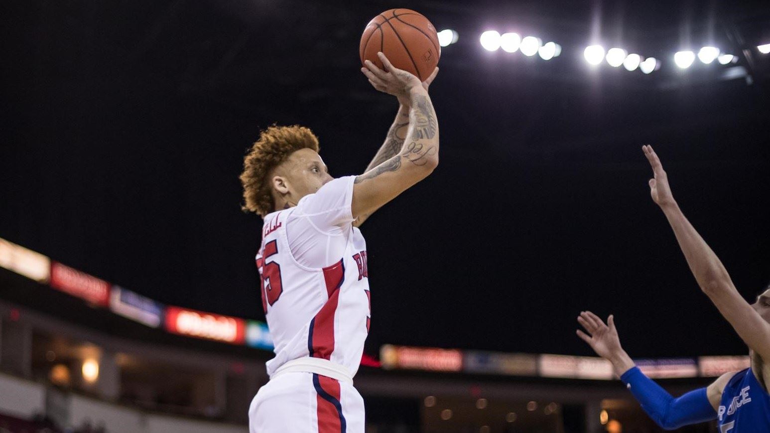 Photo of Fresno State guard Noah Blackwell shooting a jump shot against Air Force's
