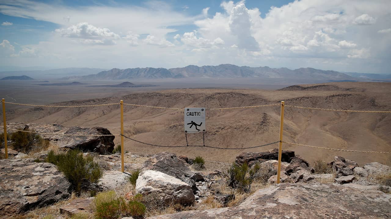 Photo of signs near the crest of Yucca Mountain in Mercury, Nv.