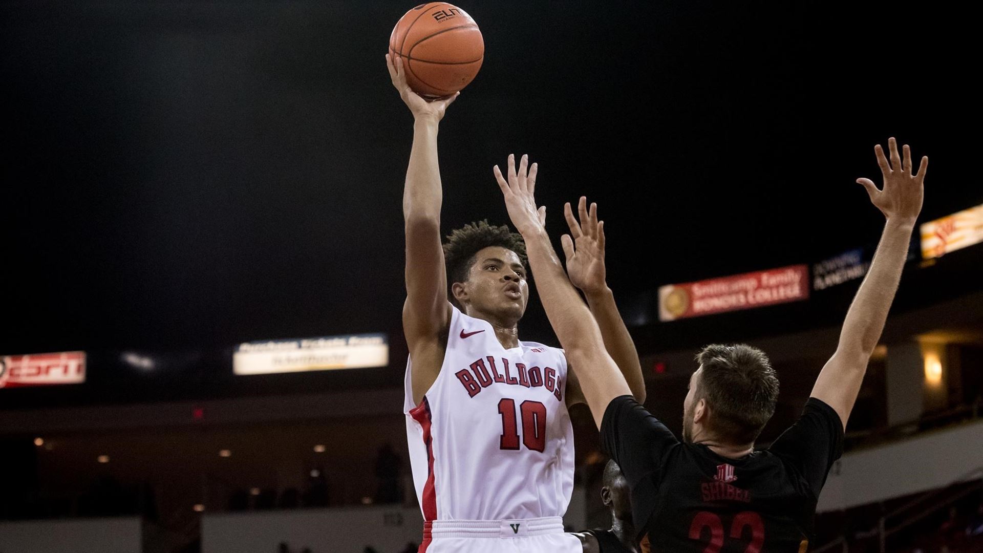Orlando Williams launches a shot at the basket