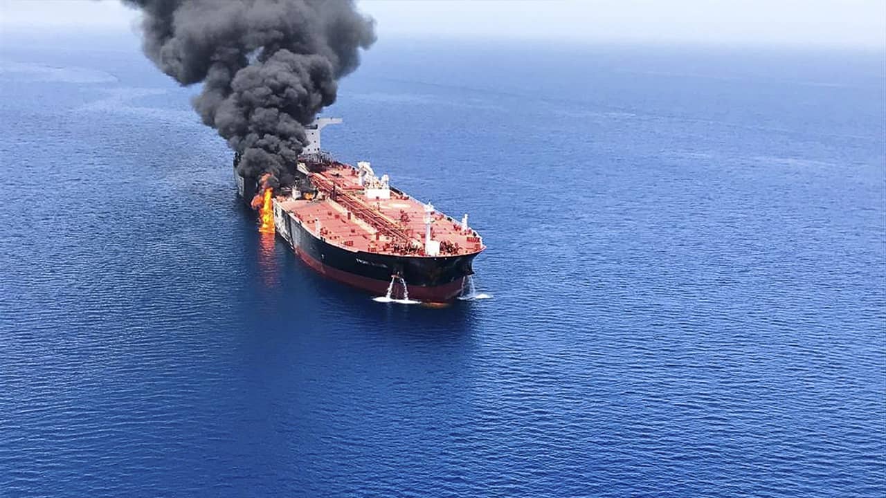 Photo of oil tanker on fire in the sea of Oman