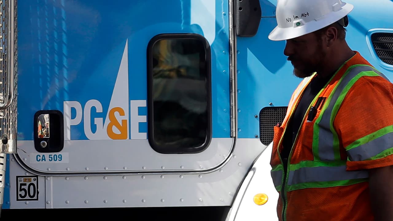 Photo of PG&E worker and truck