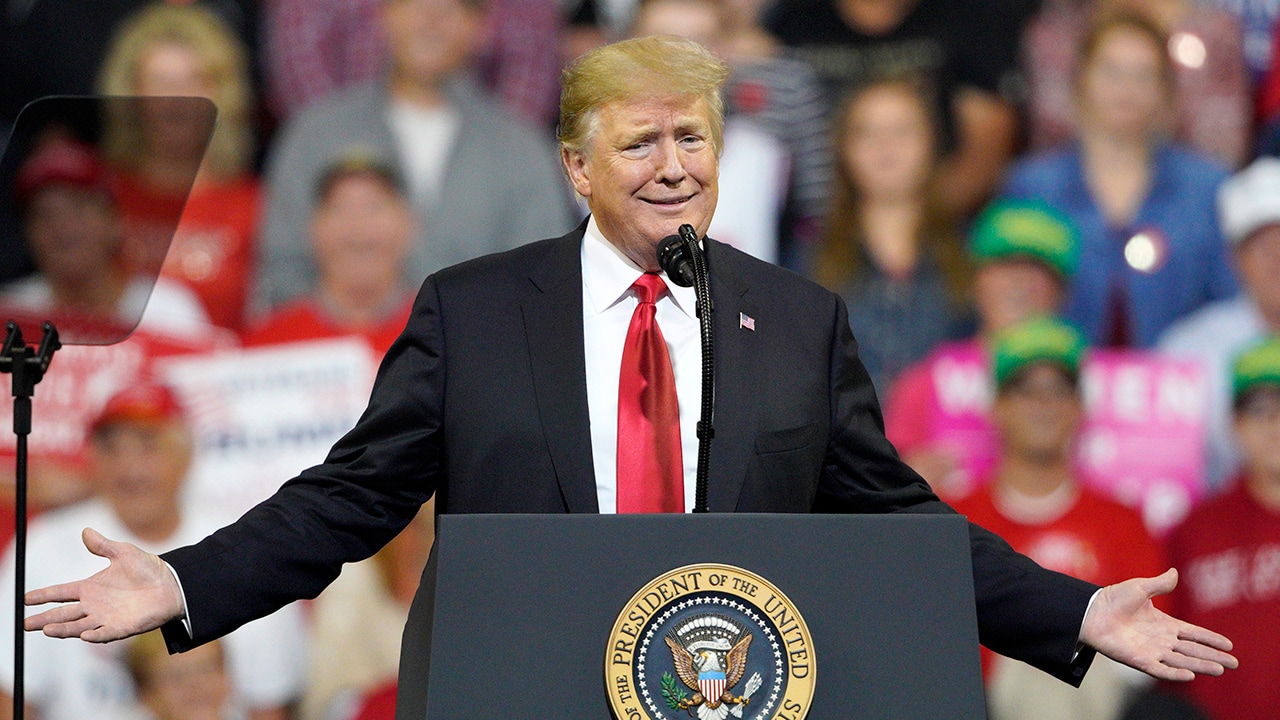 Photo of President Donald Trump speaking at a rally in Iowa