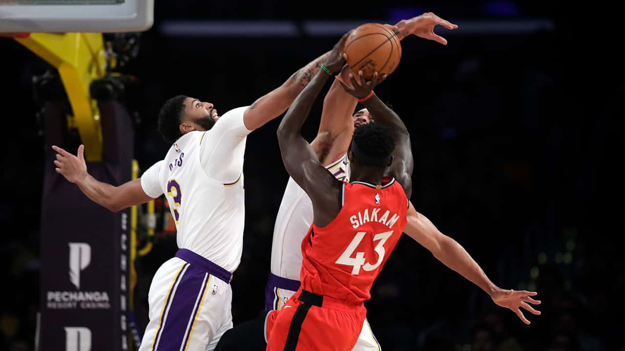Photo of Los Angeles Lakers' Anthony Davis and Toronto Raptors' Pascal Siakam