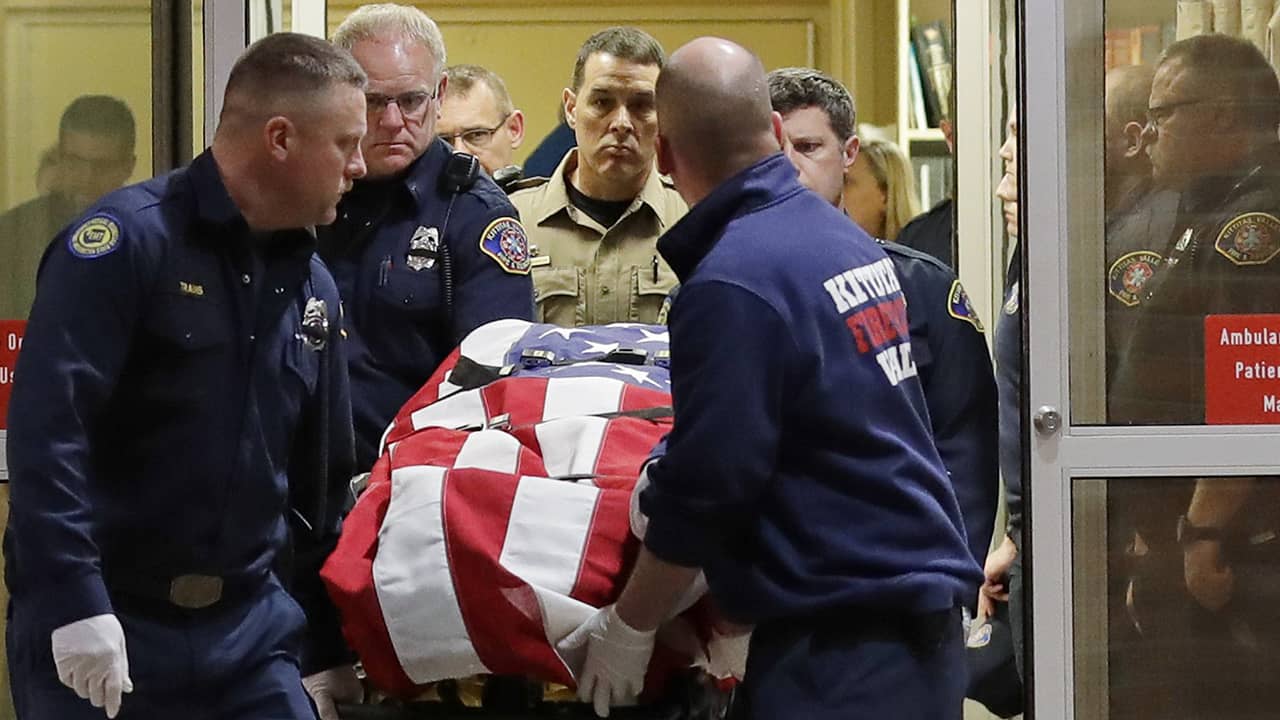 Photo of the body of a Kittitas County Sheriff's deputy draped with a US flag