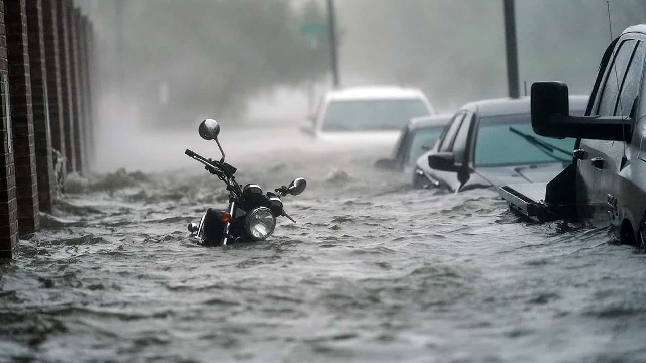 Photo of cars in flood waters