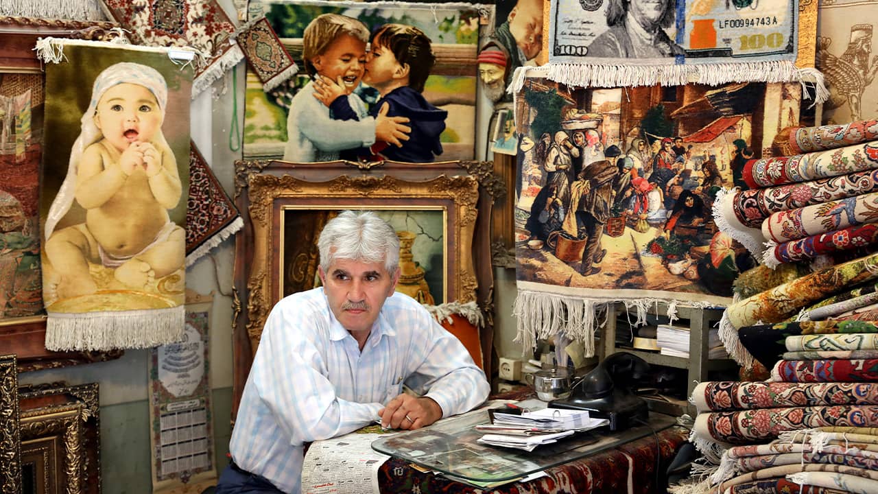 Photo of a carpet merchant in Iran