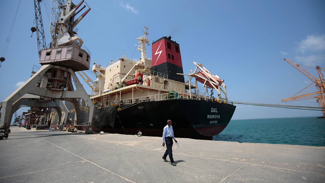 Photo of a cargo ship is docked at the port, in Hodeida, Yemen.