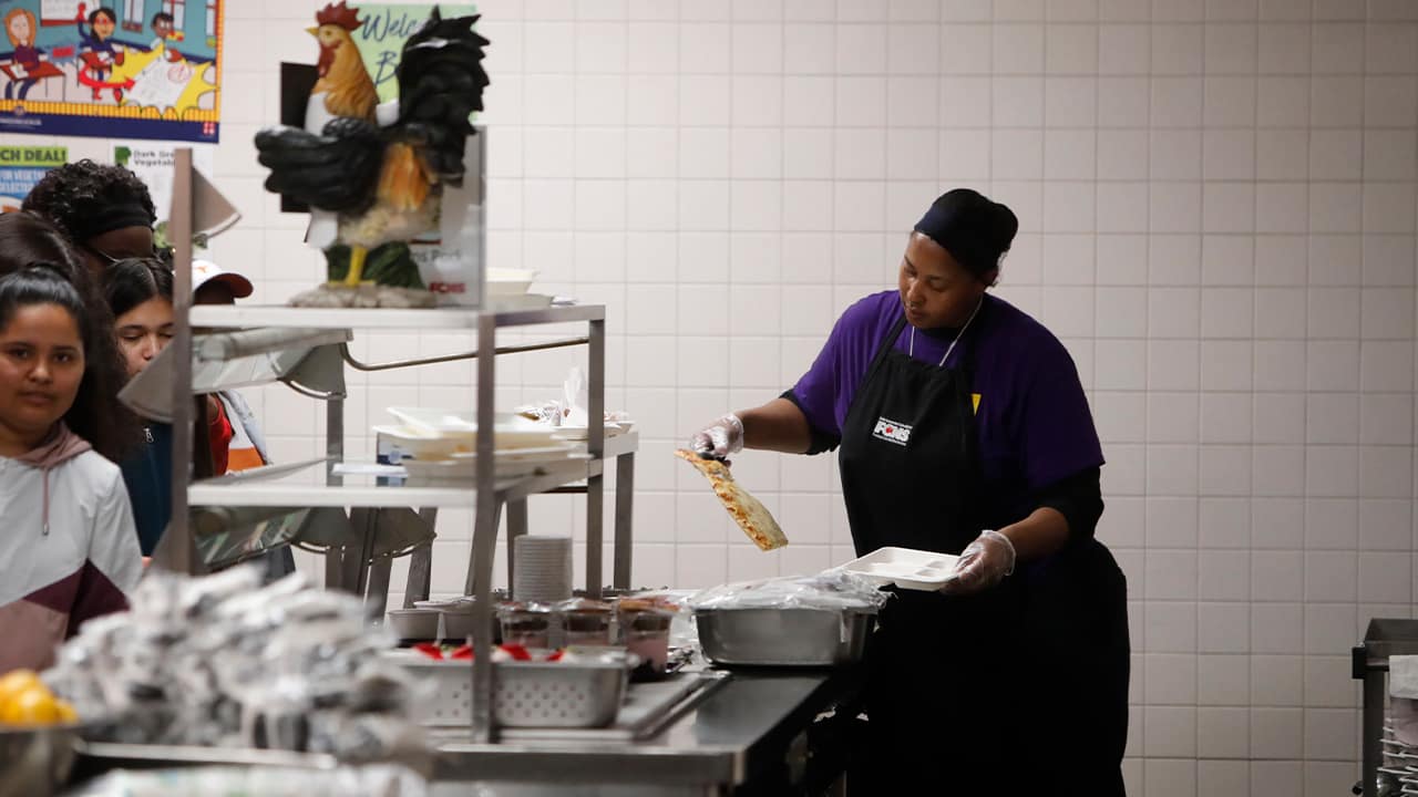 Photo of Nicole Johnson preparing lunches