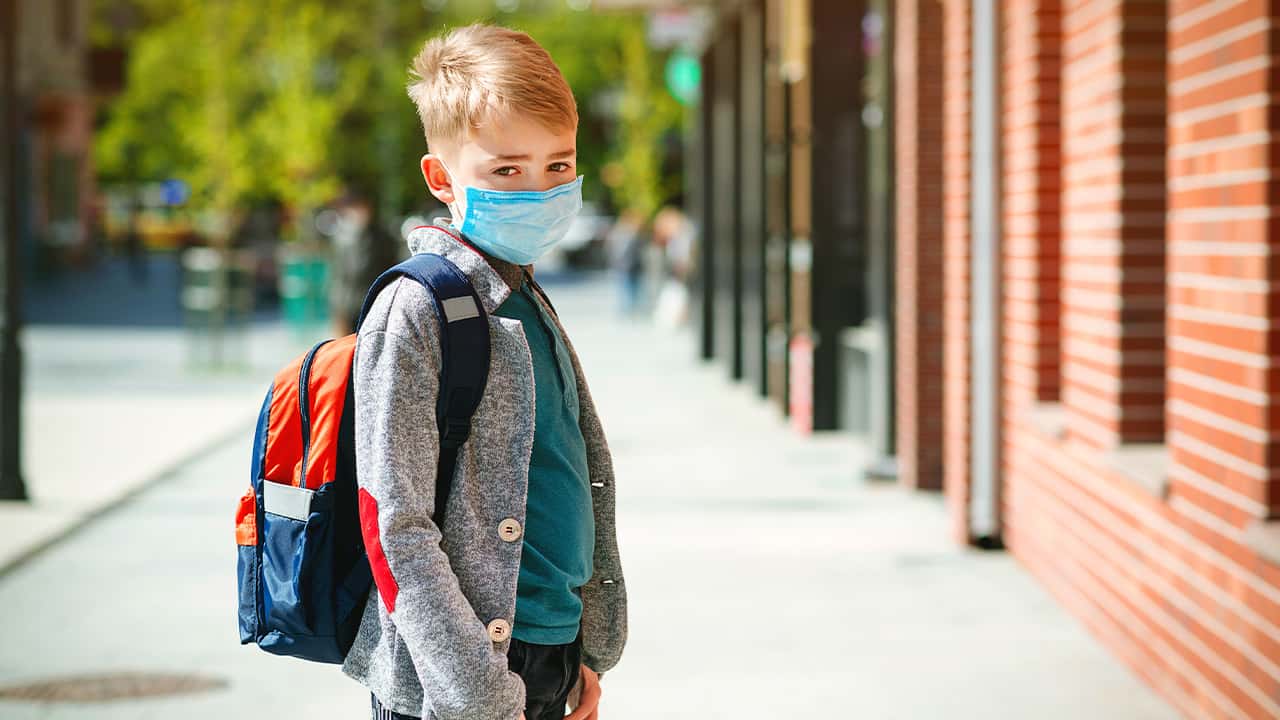 Photo of a kid at school