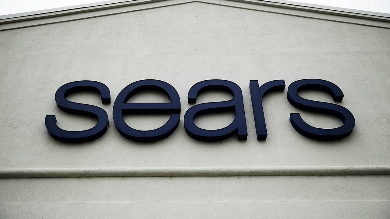 Photo of a sign for a Sears Outlet