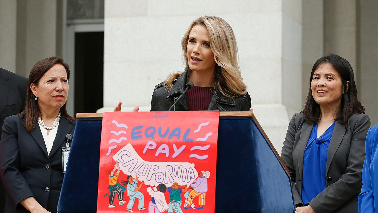 California first partner Jennifer Siebel Newsom, center, wife of Gov. Gavin Newsom, joined others to announce the #EqualPayCA campaign, in Sacramento, Calif., on April 1, 2019. Siebel Newsom, a documentary filmmaker and actor, is among the accusers of Harvey Weinstein who will testify at his rape and sexual assault trial that began Monday, Oct. 10, 2022, her attorney said. (AP Photo/Rich Pedroncelli, File)