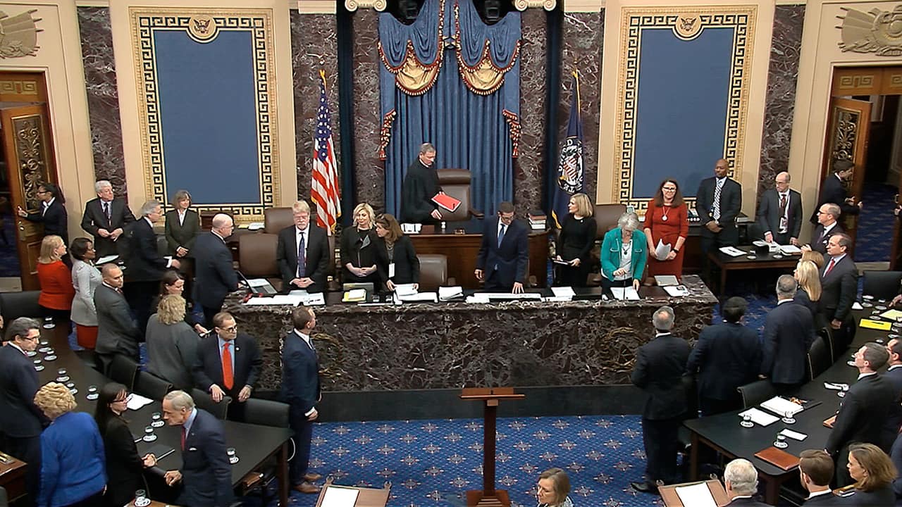 Photo of Chief Justice of the United States John Roberts arriving at the impeachment vote