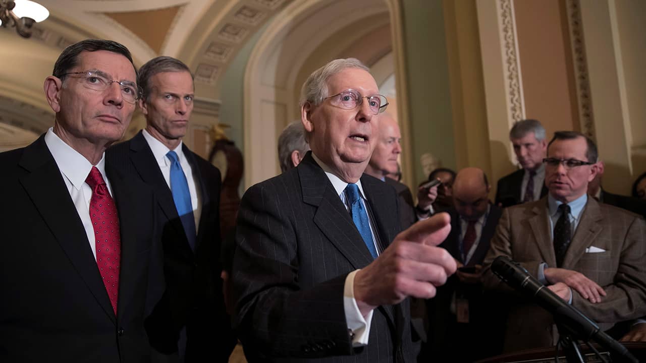 Photo of Senate Majority Leader Mitch McConnell, R-Ky., joined from left by Sen. John Barrasso, R-Wyo., and Sen. John Thune, R-S.D.