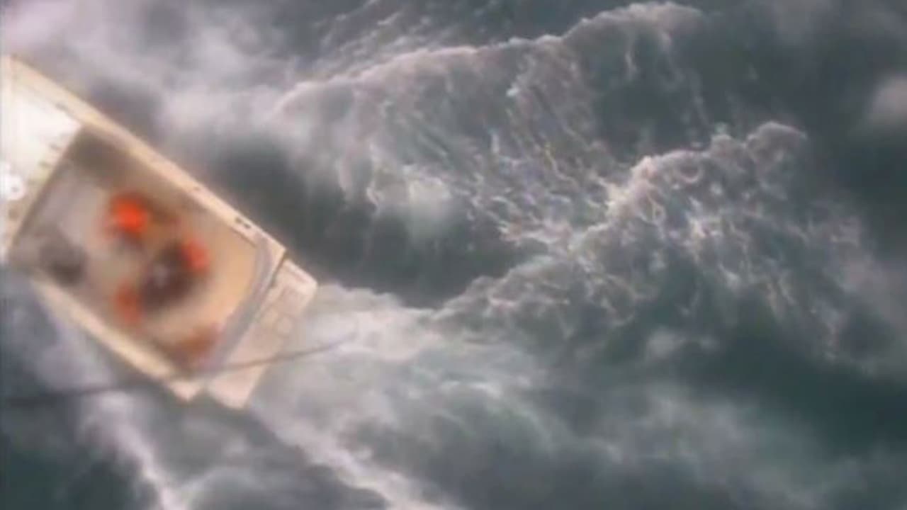 Coast Guard video footage posted on Twitter shows the man, wearing a full-body wetsuit, being hoisted up from the boat into the helicopter.