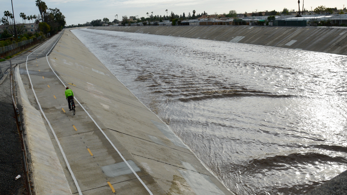 A photo of swollen Coyote Creek in Cypress, California