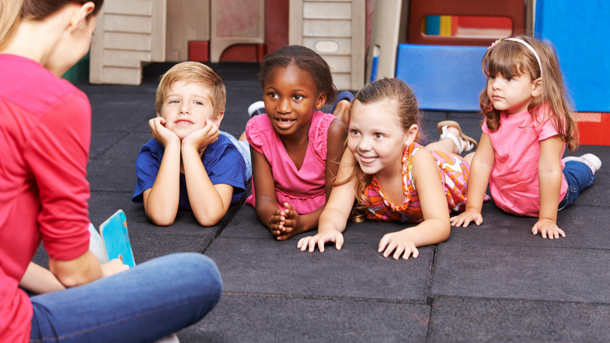 Shutterstock photo of nursery school teacher and her flock