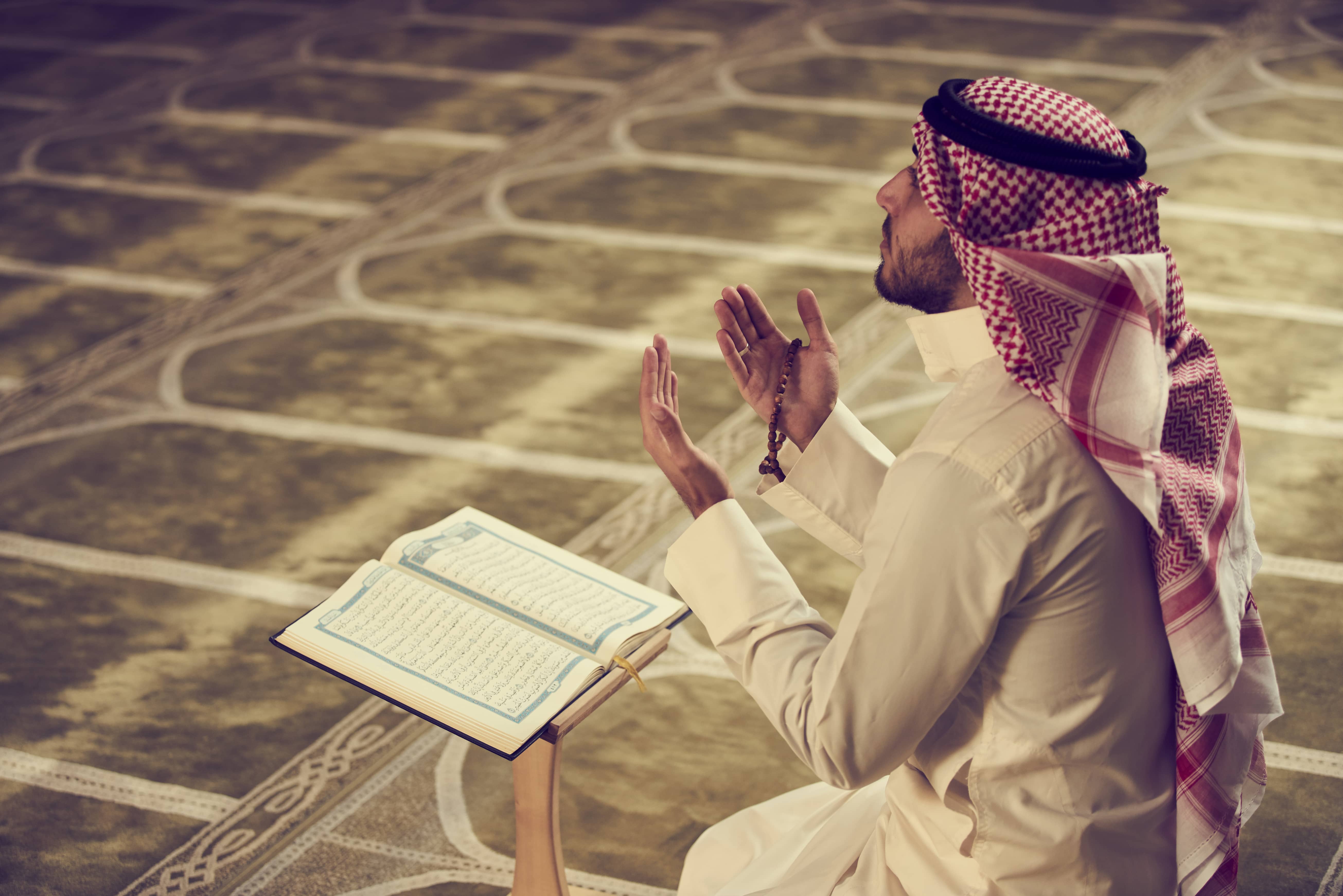 Photo of a muslim man praying